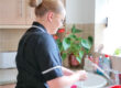 Home Carer washing up. home care services Leighton Buzzard, carers Oxford UK services, Kings Langley home care support, domiciliary care services UK